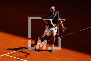 2023-05-02 - Daniel Altaimer of Germany in action against Jaume Munar of Spain during the Mutua Madrid Open 2023, Masters 1000 tennis tournament on May 2, 2023 at Caja Magica in Madrid, Spain - TENNIS - MUTUA MADRID OPEN 2023 - INTERNATIONALS - TENNIS