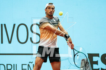 2023-05-02 - Pedro Cachin of Argentina in action against Jan-Lennard Struff of Germany during the Mutua Madrid Open 2023, Masters 1000 tennis tournament on May 2, 2023 at Caja Magica in Madrid, Spain - TENNIS - MUTUA MADRID OPEN 2023 - INTERNATIONALS - TENNIS