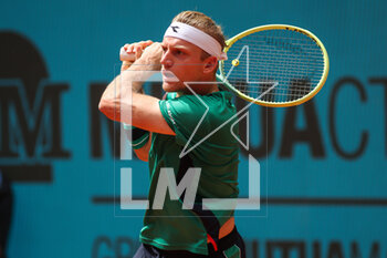 2023-05-02 - Alejandro Davidovich Fokina of Spain in action against Borna Coric of Croatia during the Mutua Madrid Open 2023, Masters 1000 tennis tournament on May 2, 2023 at Caja Magica in Madrid, Spain - TENNIS - MUTUA MADRID OPEN 2023 - INTERNATIONALS - TENNIS