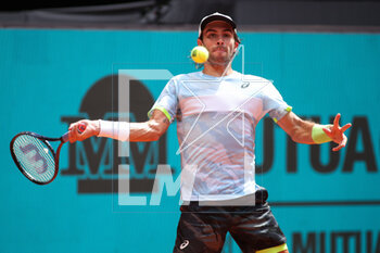 2023-05-02 - Borna Coric of Croatia in action against Alejandro Davidovich Fokina of Spain during the Mutua Madrid Open 2023, Masters 1000 tennis tournament on May 2, 2023 at Caja Magica in Madrid, Spain - TENNIS - MUTUA MADRID OPEN 2023 - INTERNATIONALS - TENNIS
