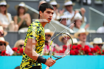 2023-05-02 - Carlos Alcaraz of Spain in action against Alexander Zverev of Germany during the Mutua Madrid Open 2023, Masters 1000 tennis tournament on May 2, 2023 at Caja Magica in Madrid, Spain - TENNIS - MUTUA MADRID OPEN 2023 - INTERNATIONALS - TENNIS
