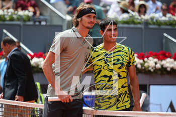 2023-05-02 - Alexander Zverev of Germany and Carlos Alcaraz of Spain pose for photo during the Mutua Madrid Open 2023, Masters 1000 tennis tournament on May 2, 2023 at Caja Magica in Madrid, Spain - TENNIS - MUTUA MADRID OPEN 2023 - INTERNATIONALS - TENNIS