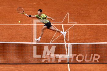 2023-05-03 - Carlos Alcaraz of Spain in action against Karen Khachanov of Russia during the Mutua Madrid Open 2023, Masters 1000 tennis tournament on May 3, 2023 at Caja Magica in Madrid, Spain - TENNIS - MUTUA MADRID OPEN 2023 - INTERNATIONALS - TENNIS