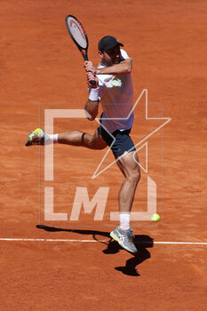 2023-05-04 - Aslan KARATSEV (Rus) in action against Zhizhen ZHANG during the Mutua Madrid Open 2023, Masters 1000 tennis tournament on May 4, 2023 at Caja Magica in Madrid, Spain - TENNIS - MUTUA MADRID OPEN 2023 - INTERNATIONALS - TENNIS