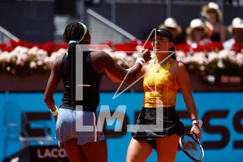 2023-05-05 - Jessica Pegula of United States plays doubles with Coco Gauff of United States against Marta Kostyuk of Ukraine and Elena-Gabriela Ruse of Romania during the Mutua Madrid Open 2023, Masters 1000 tennis tournament on May 5, 2023 at Caja Magica in Madrid, Spain - TENNIS - MUTUA MADRID OPEN 2023 - INTERNATIONALS - TENNIS