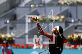 2023-05-05 - Coco Gauff of United States plays doubles with Jessica Pegula of United States against Marta Kostyuk of Ukraine and Elena-Gabriela Ruse of Romania during the Mutua Madrid Open 2023, Masters 1000 tennis tournament on May 5, 2023 at Caja Magica in Madrid, Spain - TENNIS - MUTUA MADRID OPEN 2023 - INTERNATIONALS - TENNIS