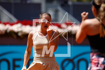 2023-05-05 - Marta Kostyuk of Ukraine plays doubles with Elena-Gabriela Ruse of Romania against Coco Gauff and Jessica Pegula of United States during the Mutua Madrid Open 2023, Masters 1000 tennis tournament on May 5, 2023 at Caja Magica in Madrid, Spain - TENNIS - MUTUA MADRID OPEN 2023 - INTERNATIONALS - TENNIS