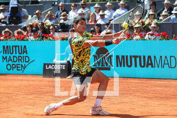 2023-05-05 - Carlos Alcaraz of Spain in action against Borna Coric of Croatia during the Mutua Madrid Open 2023, Masters 1000 tennis tournament on May 5, 2023 at Caja Magica in Madrid, Spain - TENNIS - MUTUA MADRID OPEN 2023 - INTERNATIONALS - TENNIS