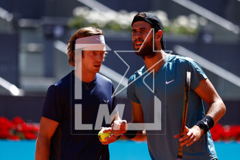 2023-05-06 - Andrey Rublev of Russia plays doubles with Karen Khachanov of Russia against Rohan Bopanna of India and Mathew Ebden of Australia during the Doubles Final Men match during the Mutua Madrid Open 2023, Masters 1000 tennis tournament on May 6, 2023 at Caja Magica in Madrid, Spain - TENNIS - MUTUA MADRID OPEN 2023 - INTERNATIONALS - TENNIS