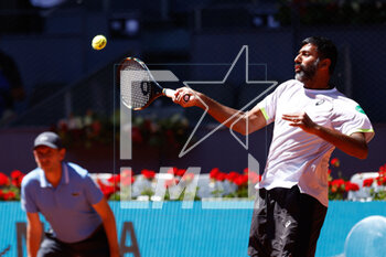 2023-05-06 - Rohan Bopanna of India plays doubles with Mathew Ebden of Australia against Andrey Rublev and Karen Khachanov of Russia during the Doubles Final Men match during the Mutua Madrid Open 2023, Masters 1000 tennis tournament on May 6, 2023 at Caja Magica in Madrid, Spain - TENNIS - MUTUA MADRID OPEN 2023 - INTERNATIONALS - TENNIS