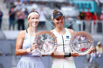 2023-05-07 - Beatriz Haddad Maia of Brazil and Victoria Azarenka of Belarus pose for photo with the trophy after the Doubles Final Women match during the Mutua Madrid Open 2023, Masters 1000 tennis tournament on May 7, 2023 at Caja Magica in Madrid, Spain - TENNIS - MUTUA MADRID OPEN 2023 - INTERNATIONALS - TENNIS