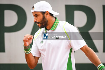 2023-05-23 - Laurent LOKOLI of France celebrates his point during the second qualifying day of Roland-Garros 2023, Grand Slam tennis tournament, Previews on May 23, 2023 at Roland-Garros stadium in Paris, France - TENNIS - ROLAND GARROS 2023 - PREVIEWS - INTERNATIONALS - TENNIS