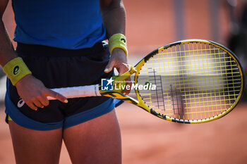 2023-05-24 - Illustration of a tennis racket with a ball during Roland-Garros 2023, Grand Slam tennis tournament, Previews on May 24, 2023 at Roland-Garros stadium in Paris, France - TENNIS - ROLAND GARROS 2023 - PREVIEWS - INTERNATIONALS - TENNIS
