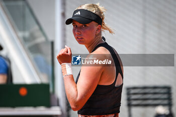 2023-05-26 - Clara TAUSON of Denmark celebrates his point during the fifth qualifying day of Roland-Garros 2023, Grand Slam tennis tournament, Previews on May 26, 2023 at Roland-Garros stadium in Paris, France - TENNIS - ROLAND GARROS 2023 - PREVIEWS - INTERNATIONALS - TENNIS