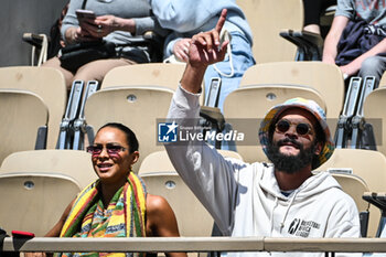 2023-05-27 - Former French-US basketball player Joakim NOAH with his wife Lais RIBEIRO Brazilian model during the concert of his father the French singer and former tennis player Yannick NOAH at Roland-Garros 2023, Grand Slam tennis tournament, Previews on May 27, 2023 at Roland-Garros stadium in Paris, France - TENNIS - ROLAND GARROS 2023 - PREVIEWS - INTERNATIONALS - TENNIS