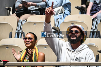 2023-05-27 - Former French-US basketball player Joakim NOAH with his wife Lais RIBEIRO Brazilian model during the concert of his father the French singer and former tennis player Yannick NOAH at Roland-Garros 2023, Grand Slam tennis tournament, Previews on May 27, 2023 at Roland-Garros stadium in Paris, France - TENNIS - ROLAND GARROS 2023 - PREVIEWS - INTERNATIONALS - TENNIS