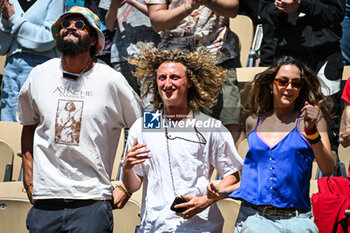 2023-05-27 - Former French-US basketball player Joakim NOAH, French model Jenaye NOAH and Joalukas NOAH during the concert of their father the singer and former French tennis player Yannick NOAH at Roland-Garros 2023, Grand Slam tennis tournament, Previews on May 27, 2023 at Roland-Garros stadium in Paris, France - TENNIS - ROLAND GARROS 2023 - PREVIEWS - INTERNATIONALS - TENNIS