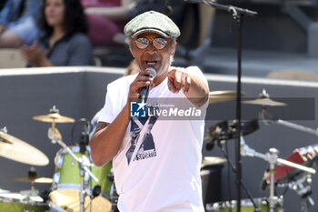 2023-05-27 - Yannick Noah of France performs during a concert on Central Court 40 years after his victory at the French Open 1983 during Kids' Day now baptised 'Yannick Noah Day' on the eve of the French Open 2023, second Grand Slam tennis tournament of the season on May 27, 2023 at stade Roland-Garros in Paris, France - TENNIS - ROLAND GARROS 2023 - PREVIEWS - INTERNATIONALS - TENNIS