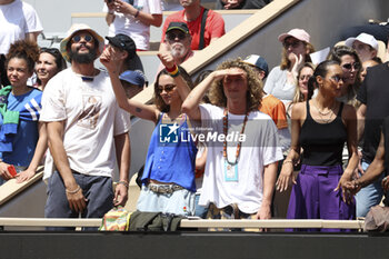 2023-05-27 - Yannick Noah's children - Joakim Noah, Jenaye Noah, Joalukas Noah, right Joakim's wife Lais Ribeiro - attend his concert on Central Court 40 years after his victory at the French Open 1983 during Kids' Day now baptised 'Yannick Noah Day' on the eve of the French Open 2023, second Grand Slam tennis tournament of the season on May 27, 2023 at stade Roland-Garros in Paris, France - TENNIS - ROLAND GARROS 2023 - PREVIEWS - INTERNATIONALS - TENNIS