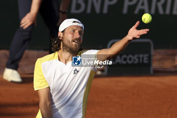 2023-05-28 - Lucas Pouille of France during day 1 of the 2023 French Open, Roland-Garros 2023, second Grand Slam tennis tournament of the year, on May 28, 2023 at stade Roland-Garros in Paris, France - TENNIS - ROLAND GARROS 2023 - WEEK 1 - INTERNATIONALS - TENNIS