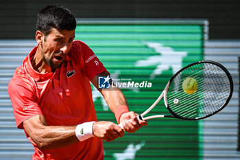 2023-05-29 - Novak DJOKOVIC of Serbia during the second day of Roland-Garros 2023, Grand Slam tennis tournament, on May 29, 2023 at Roland-Garros stadium in Paris, France - TENNIS - ROLAND GARROS 2023 - WEEK 1 - INTERNATIONALS - TENNIS