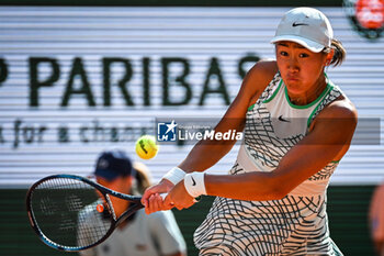 2023-05-29 - Xiyu WANG of China during the second day of Roland-Garros 2023, Grand Slam tennis tournament, on May 29, 2023 at Roland-Garros stadium in Paris, France - TENNIS - ROLAND GARROS 2023 - WEEK 1 - INTERNATIONALS - TENNIS