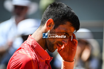 2023-05-29 - Novak DJOKOVIC of Serbia during the second day of Roland-Garros 2023, Grand Slam tennis tournament, on May 29, 2023 at Roland-Garros stadium in Paris, France - TENNIS - ROLAND GARROS 2023 - WEEK 1 - INTERNATIONALS - TENNIS