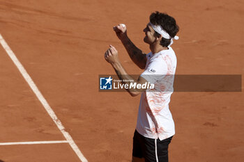 2023-05-30 - Thiago Seyboth Wild of Brazil celebrates winning his first round match against Daniil Medvedev of Russia during day 3 of the 2023 French Open, Roland-Garros 2023, second Grand Slam tennis tournament of the year, on May 30, 2023 at Stade Roland-Garros in Paris, France - TENNIS - ROLAND GARROS 2023 - WEEK 1 - INTERNATIONALS - TENNIS