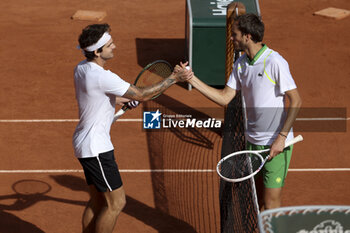 2023-05-30 - Thiago Seyboth Wild of Brazil shakes hands with Daniil Medvedev of Russia after his first round victory during day 3 of the 2023 French Open, Roland-Garros 2023, second Grand Slam tennis tournament of the year, on May 30, 2023 at Stade Roland-Garros in Paris, France - TENNIS - ROLAND GARROS 2023 - WEEK 1 - INTERNATIONALS - TENNIS