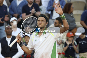 2023-05-30 - Arthur Rinderknech of France celebrates his first round victory against Richard Gasquet of France during day 3 of the 2023 French Open, Roland-Garros 2023, second Grand Slam tennis tournament of the year, on May 30, 2023 at Stade Roland-Garros in Paris, France - TENNIS - ROLAND GARROS 2023 - WEEK 1 - INTERNATIONALS - TENNIS