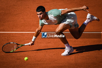 2023-05-31 - Carlos ALCARAZ of Spain during the fourth day of Roland-Garros 2023, Grand Slam tennis tournament, on May 31, 2023 at Roland-Garros stadium in Paris, France - TENNIS - ROLAND GARROS 2023 - WEEK 1 - INTERNATIONALS - TENNIS
