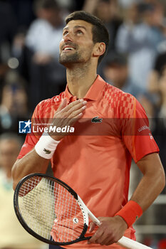 2023-05-31 - Novak Djokovic of Serbia celebrates his victory over Marton Fucsovics of Hungary during day 4 of the 2023 French Open, Roland-Garros 2023, second Grand Slam tennis tournament of the year, on May 31, 2023 at Stade Roland-Garros in Paris, France - TENNIS - ROLAND GARROS 2023 - WEEK 1 - INTERNATIONALS - TENNIS