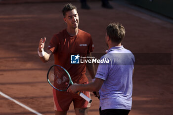 2023-05-31 - Thanasi Kokkinakis of Australia shakes hands with Stan Wawrinka of Switzerland after his victory during day 4 of the 2023 French Open, Roland-Garros 2023, second Grand Slam tennis tournament of the year, on May 31, 2023 at Stade Roland-Garros in Paris, France - TENNIS - ROLAND GARROS 2023 - WEEK 1 - INTERNATIONALS - TENNIS