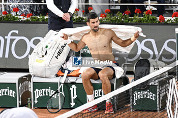 2023-05-31 - Novak Djokovic (bare-chested, shirtless, naked torso) during the French Open, Grand Slam tennis tournament on May 31, 2023 at Roland Garros stadium in Paris, France. Photo Victor Joly / DPPI - TENNIS - ROLAND GARROS 2023 - WEEK 1 - INTERNATIONALS - TENNIS