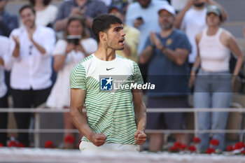 2023-06-04 - Carlos Alcaraz of Spain celebrates his victory over Lorenzo Musetti of Italy during day 8 of the 2023 French Open, Roland-Garros 2023, second Grand Slam tennis tournament of the year, on June 4, 2023 at Stade Roland-Garros in Paris, France - TENNIS - ROLAND GARROS 2023 - WEEK 1 - INTERNATIONALS - TENNIS