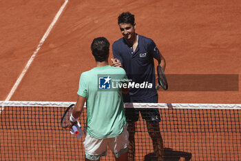 2023-06-04 - Karen Khachanov of Russia shakes hands with Lorenzo Sonego of Italy after his victory during day 8 of the 2023 French Open, Roland-Garros 2023, second Grand Slam tennis tournament of the year, on June 4, 2023 at Stade Roland-Garros in Paris, France - TENNIS - ROLAND GARROS 2023 - WEEK 1 - INTERNATIONALS - TENNIS