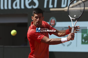 2023-06-04 - Novak Djokovic of Serbia during day 8 of the 2023 French Open, Roland-Garros 2023, second Grand Slam tennis tournament of the year, on June 4, 2023 at Stade Roland-Garros in Paris, France - TENNIS - ROLAND GARROS 2023 - WEEK 1 - INTERNATIONALS - TENNIS
