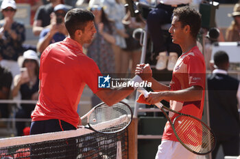 2023-06-04 - Novak Djokovic of Serbia shakes hands with Juan Pablo Varillas of Peru after his victory during day 8 of the 2023 French Open, Roland-Garros 2023, second Grand Slam tennis tournament of the year, on June 4, 2023 at Stade Roland-Garros in Paris, France - TENNIS - ROLAND GARROS 2023 - WEEK 1 - INTERNATIONALS - TENNIS