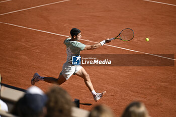 2023-06-04 - Carlos Alcaraz Garfia of Spain hits a forehand during the French Open, Grand Slam tennis tournament on June 4, 2023 at Roland Garros stadium in Paris, France. Photo Victor Joly / DPPI - TENNIS - ROLAND GARROS 2023 - WEEK 1 - INTERNATIONALS - TENNIS