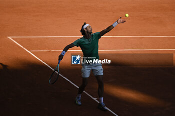 2023-06-04 - Lorenzo Musetti of Italy serves during the French Open, Grand Slam tennis tournament on June 4, 2023 at Roland Garros stadium in Paris, France. Photo Victor Joly / DPPI - TENNIS - ROLAND GARROS 2023 - WEEK 1 - INTERNATIONALS - TENNIS