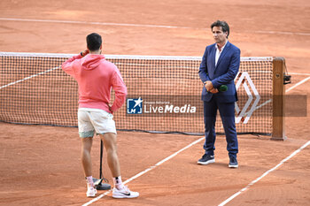 2023-06-04 - Fabrice Santoro during an interview with Carlos Alcaraz Garfia of Spain during the French Open, Grand Slam tennis tournament on June 4, 2023 at Roland Garros stadium in Paris, France. Photo Victor Joly / DPPI - TENNIS - ROLAND GARROS 2023 - WEEK 1 - INTERNATIONALS - TENNIS