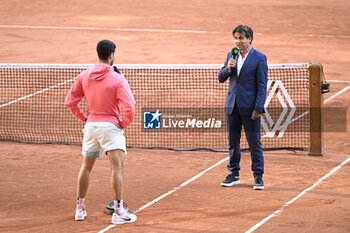 2023-06-04 - Fabrice Santoro during an interview with Carlos Alcaraz Garfia of Spain during the French Open, Grand Slam tennis tournament on June 4, 2023 at Roland Garros stadium in Paris, France. Photo Victor Joly / DPPI - TENNIS - ROLAND GARROS 2023 - WEEK 1 - INTERNATIONALS - TENNIS