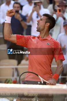 2023-06-06 - Novak Djokovic of Serbia celebrates his victory during the French Open 2023, Roland-Garros 2023, Grand Slam tennis tournament, on june 6, 2023 at Stade Roland-Garros in Paris, France - TENNIS - ROLAND GARROS 2023 - WEEK 2 - INTERNATIONALS - TENNIS
