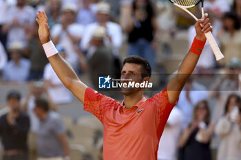 2023-06-06 - Novak Djokovic of Serbia celebrates his victory during the French Open 2023, Roland-Garros 2023, Grand Slam tennis tournament, on june 6, 2023 at Stade Roland-Garros in Paris, France - TENNIS - ROLAND GARROS 2023 - WEEK 2 - INTERNATIONALS - TENNIS