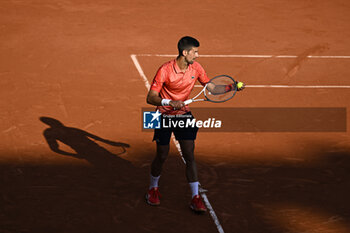 2023-06-06 - Novak Djokovic serves during the French Open, Grand Slam tennis tournament on June 6, 2023 at Roland Garros stadium in Paris, France. Photo Victor Joly / DPPI - TENNIS - ROLAND GARROS 2023 - WEEK 2 - INTERNATIONALS - TENNIS