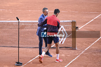 2023-06-06 - Novak Djokovic and Mats Wilander during an interview during the French Open, Grand Slam tennis tournament on June 6, 2023 at Roland Garros stadium in Paris, France. Photo Victor Joly / DPPI - TENNIS - ROLAND GARROS 2023 - WEEK 2 - INTERNATIONALS - TENNIS