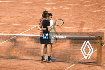 2023-06-06 - Stefanos Tsitsipas and Carlos Alcaraz during the French Open, Grand Slam tennis tournament on June 6, 2023 at Roland Garros stadium in Paris, France. Photo Victor Joly / DPPI - TENNIS - ROLAND GARROS 2023 - WEEK 2 - INTERNATIONALS - TENNIS