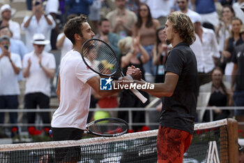 2023-06-07 - Alexander Zverev of Germany shakes hands with Tomas Martin Etcheverry of Argentina (left) after his victory during the French Open 2023, Roland-Garros 2023, Grand Slam tennis tournament, on June 7, 2023 at Stade Roland-Garros in Paris, France - TENNIS - ROLAND GARROS 2023 - WEEK 2 - INTERNATIONALS - TENNIS