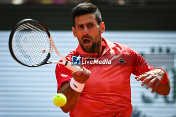 2023-06-09 - Novak DJOKOVIC of Serbia during the thirteenth day of Roland-Garros 2023, Grand Slam tennis tournament, on June 09, 2023 at Roland-Garros stadium in Paris, France - TENNIS - ROLAND GARROS 2023 - WEEK 2 - INTERNATIONALS - TENNIS