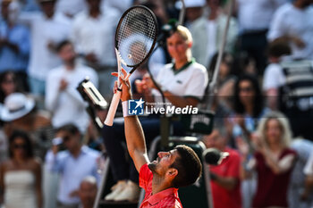 2023-06-09 - Novak DJOKOVIC of Serbia celebrates his victory during the thirteenth day of Roland-Garros 2023, Grand Slam tennis tournament, on June 09, 2023 at Roland-Garros stadium in Paris, France - TENNIS - ROLAND GARROS 2023 - WEEK 2 - INTERNATIONALS - TENNIS